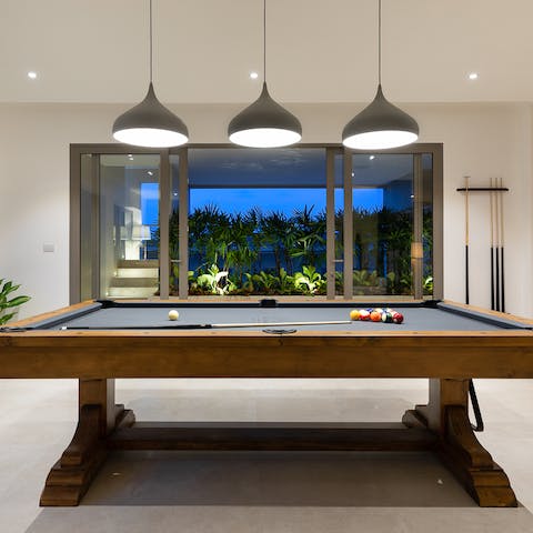 Play a game of pool in your private games room