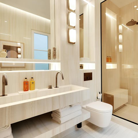 Get ready in the stylish bathroom and then head out to a Parisian restaurant