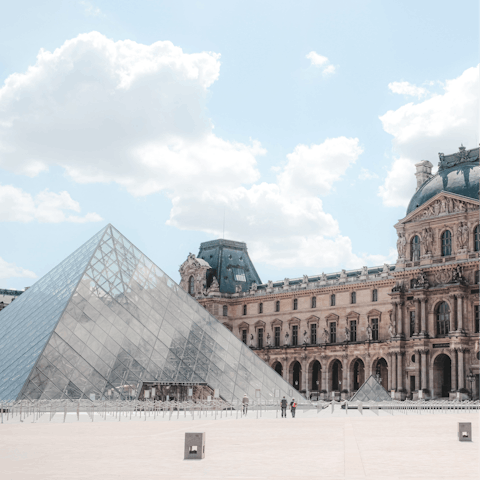 Explore Paris, including the Louvre Museum, a short stroll away