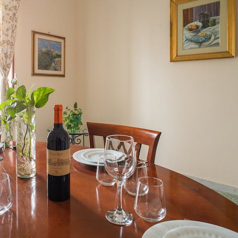 Embrace the simple pleasure of beautiful wine and conversation at the table 