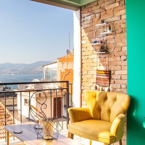 Watch the sun rise and set over the Aegean Sea from your enviable vantage point