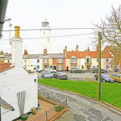 Admire the lighthouse from the top floor of the cottage