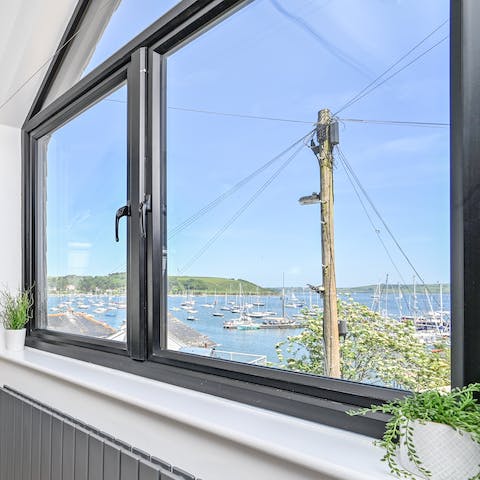 Watch the boats sail by from your living room window