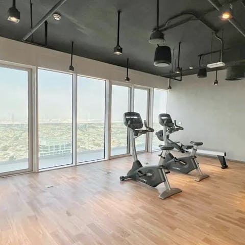 Work up an appetite in the building's gym, overlooking the city