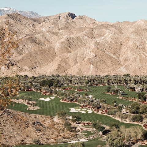 Head to the nearest Palm Springs golf course, a five-minute drive away