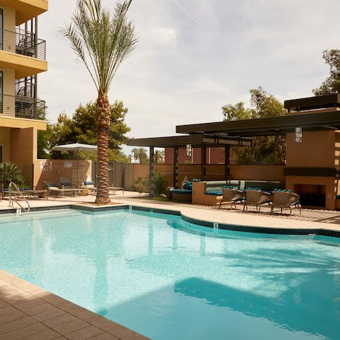 Take a refreshing dip in the building's communal pool