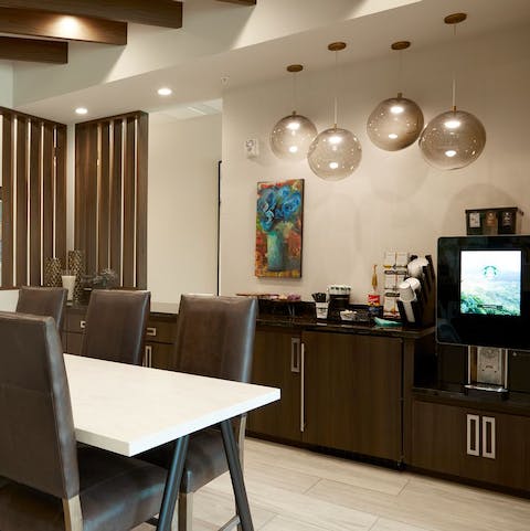 Help yourself to coffee in the guest lounge and communal workspace