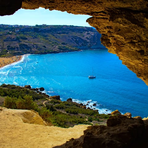 Explore the natural beauty of Gozo with its beautiful coves and rugged cliffs