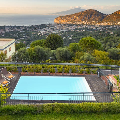 Admire the epic location above the Italian hills