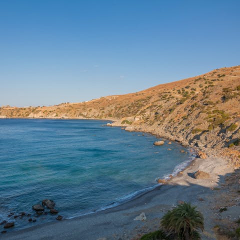 Stroll straight down to the beach from this home in the hills of Agios Pavios