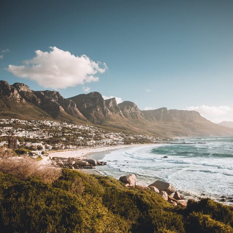 Wander down to Capes Bay Beach and dip your toes in the Atlantic Ocean