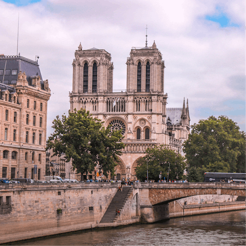 Gaze up at beautiful Notre Dame, twelve minutes away on foot