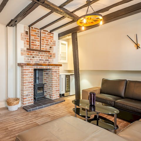 Unwind in the living room next to the crackling fire