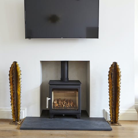 Get that cosy feel with the wood-burning stove in the living room