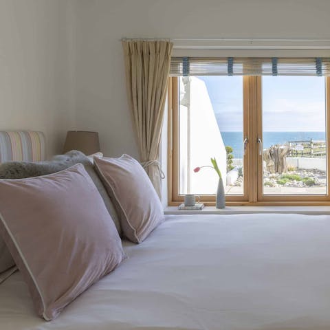 Wake up to sea views each morning from the primary bedroom