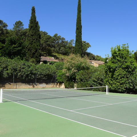 Practice your forehand slice on the private tennis court