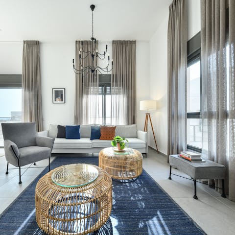 Enjoy a light-filled living room thanks to huge windows