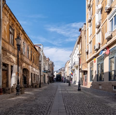Explore the cobbled streets of Bucharest's old town, a stone's throw from home