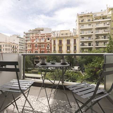 Enjoy people-watching while you sip on your morning coffee on the balcony