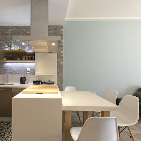 Cook up your favourite meals in the kitchen and tuck in around the dining table