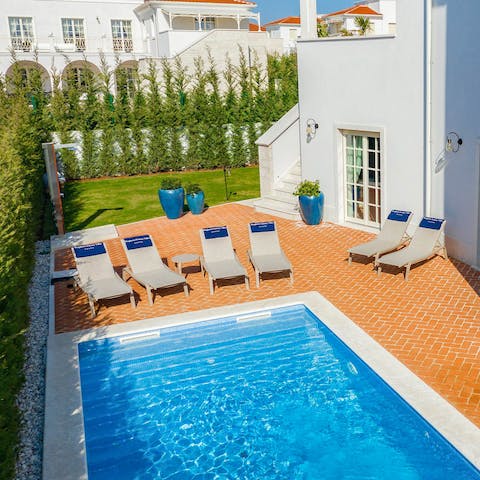 Have a siesta on one of the sun loungers by the private pool