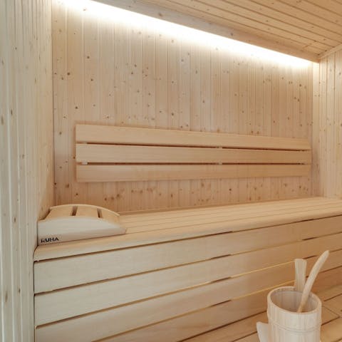 Jump in the sauna to warm up after a day out skiing