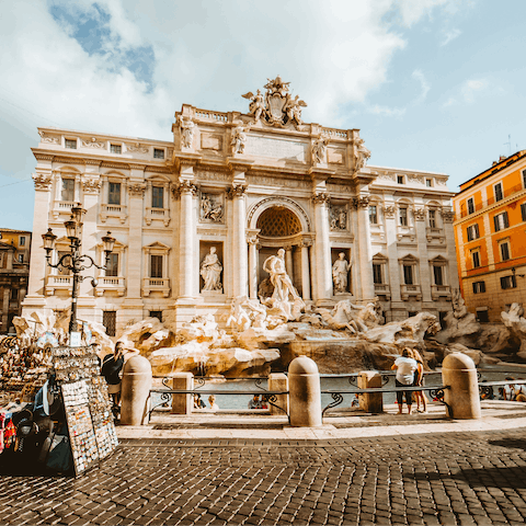 Hop on a bus to the magnificent Trevi Fountain, the most beautiful in Rome
