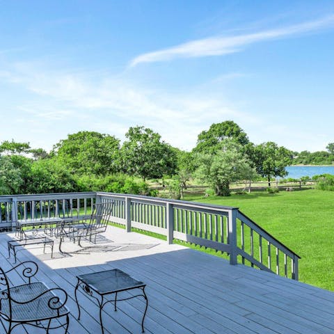 Enjoy views of the lake as you enjoy a glass of wine on the deck