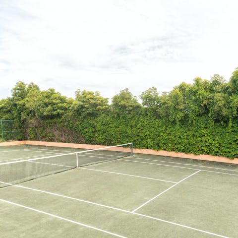 Embrace energising games of tennis on the private court 