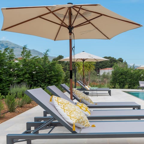 Stretch out on a sun lounger and savour a glass of Nero d'Avola