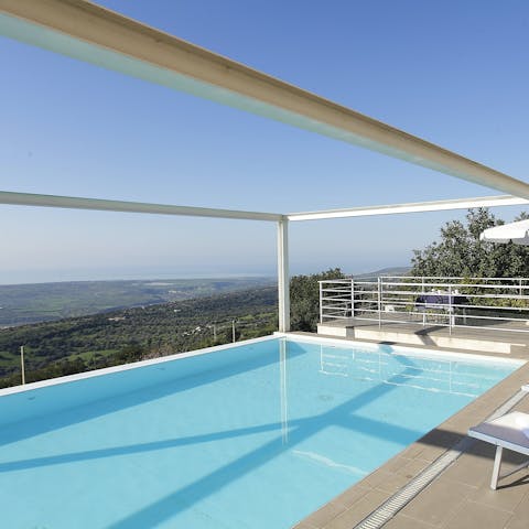 Relax by the pool or go for a swim and admire the views