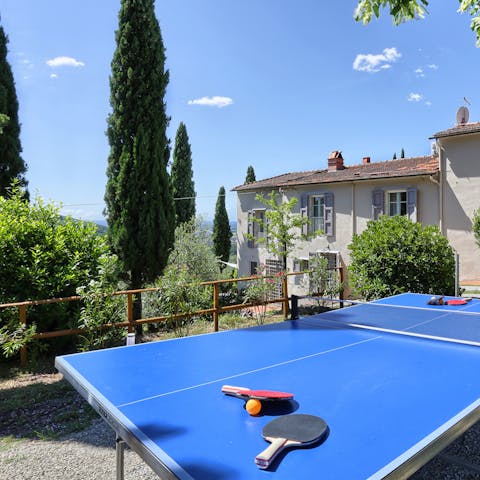 Embrace friendly competition with games of table tennis in the garden