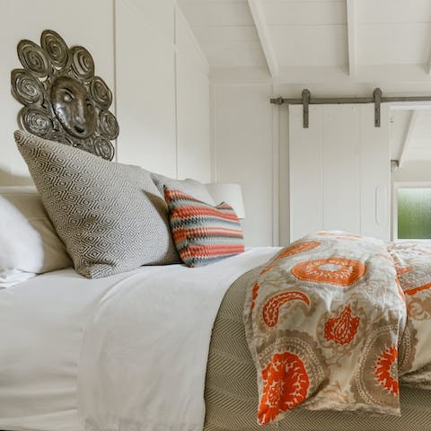 Wake up to the sound of distant waves in the charming crow’s nest bedroom