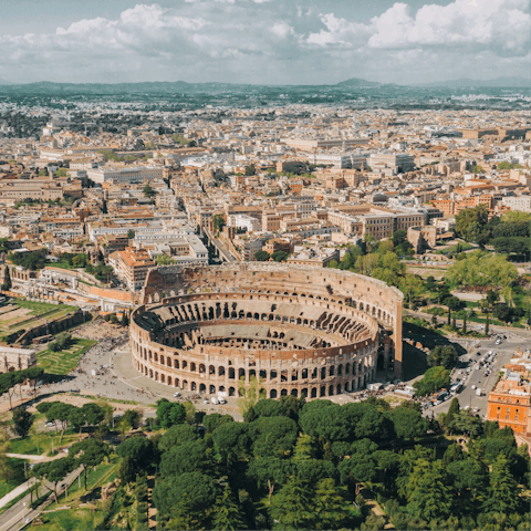 Marvel at the Colosseum, about twenty minutes away on foot