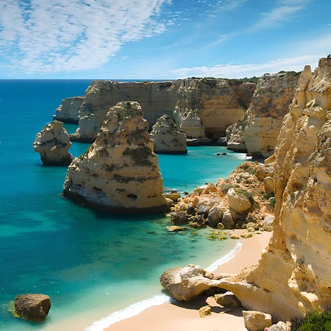 Explore the beautiful beaches and hidden coves of the Algarve
