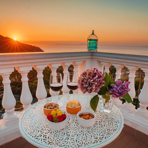 Enjoy a glass of Italian wine on the sea-facing terrace