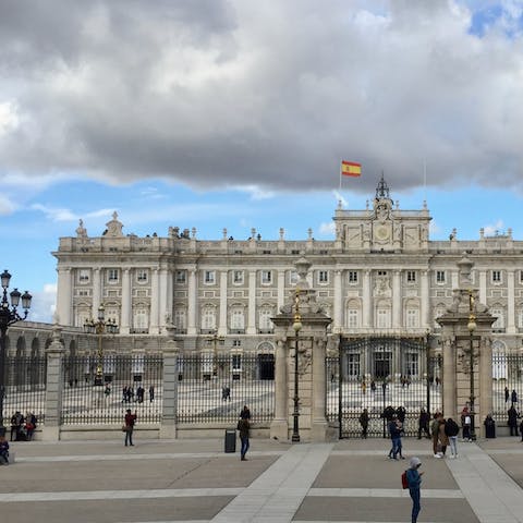Visit the Grand Palace of Madrid, a ten-minute walk from this home