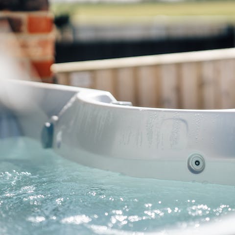 Soothe your aching muscles with an evening hot tub session