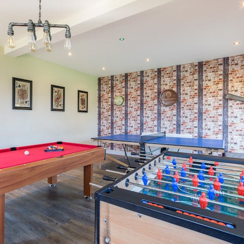 Challenge friends and family to a game of pool or ping-pong