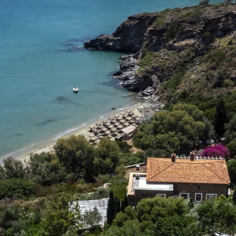 Stroll down to the local sandy beach via the private pedestrian road