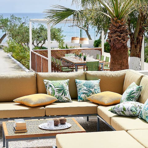 Enjoy aperitifs in plush lounge areas tucked into island vegetation