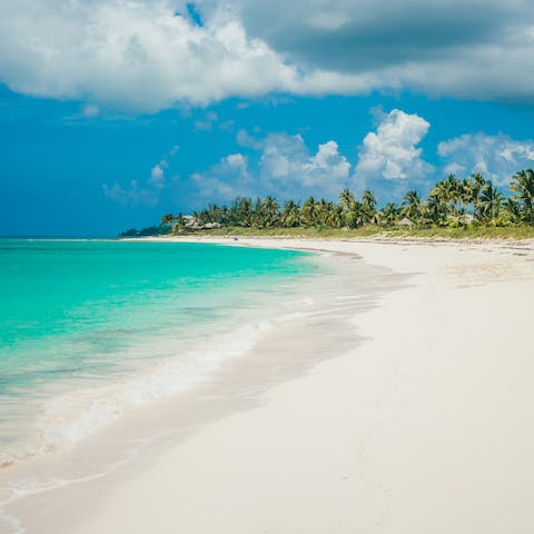 Wander the soft sands of a Bahamas beach – a nine-minute walk away