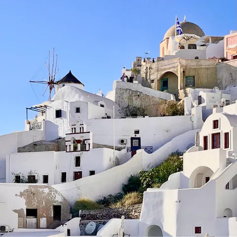Explore the whitewashed houses and winding streets of Mykonos 