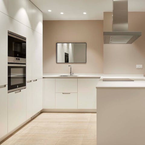 Make the most of the sleek and fully equipped kitchen