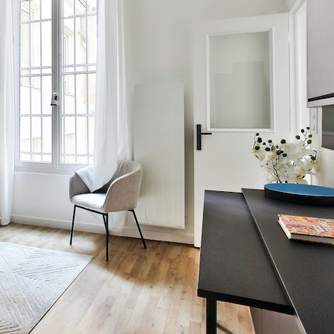 Pull out the sleek desk for a practical working space
