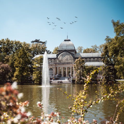 Enjoy taking afternoon strolls in El Retiro Park, a twenty-five-minute walk away