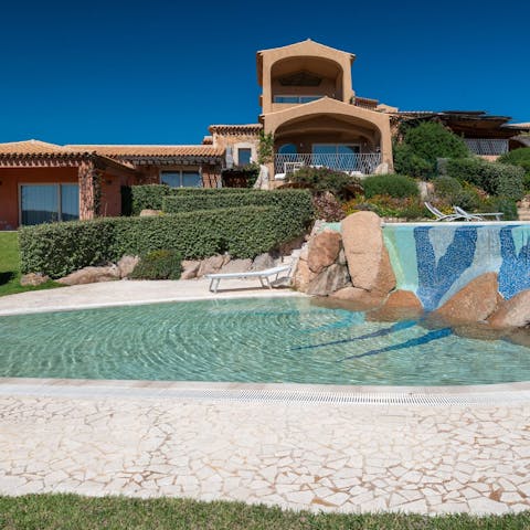 Cool off from the Sardinia sunshine in the communal pools
