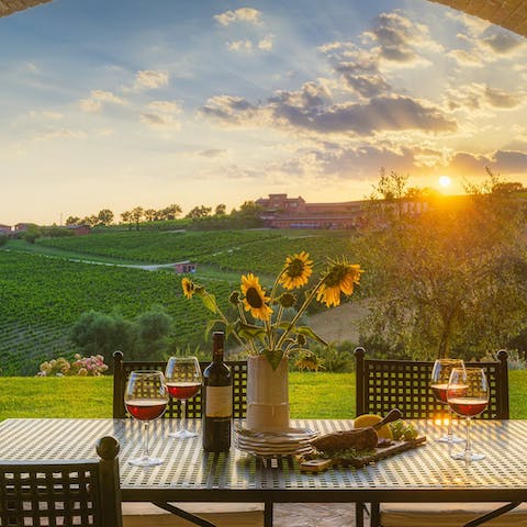Open a bottle of wine and dine on Italian dishes at sunset