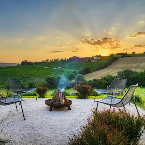 Gather around the fire pit after dinner and admire the Umbrian views