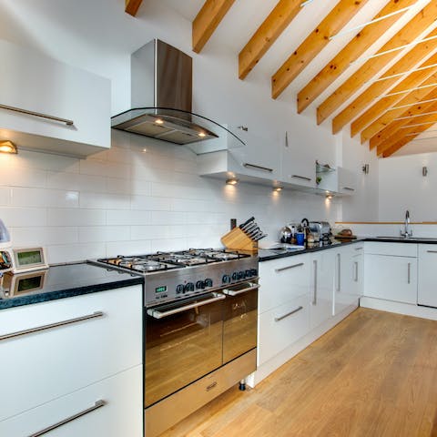 Cook up a delicious homegrown meal in the beautiful modern kitchen